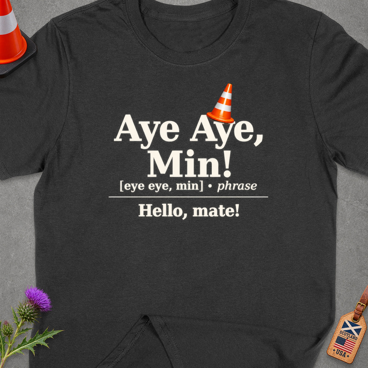 T-shirt with "Aye Aye, Min!" text, traffic cone graphic, and Scottish and US flags.