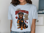 Rottweiler sitting with keys and text "My Rottweiler Runs This House."
