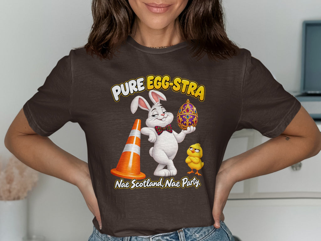 White bunny holds jeweled egg next to traffic cone and chick; "Pure Egg-stra" and "Nae Scotland, Nae Party."