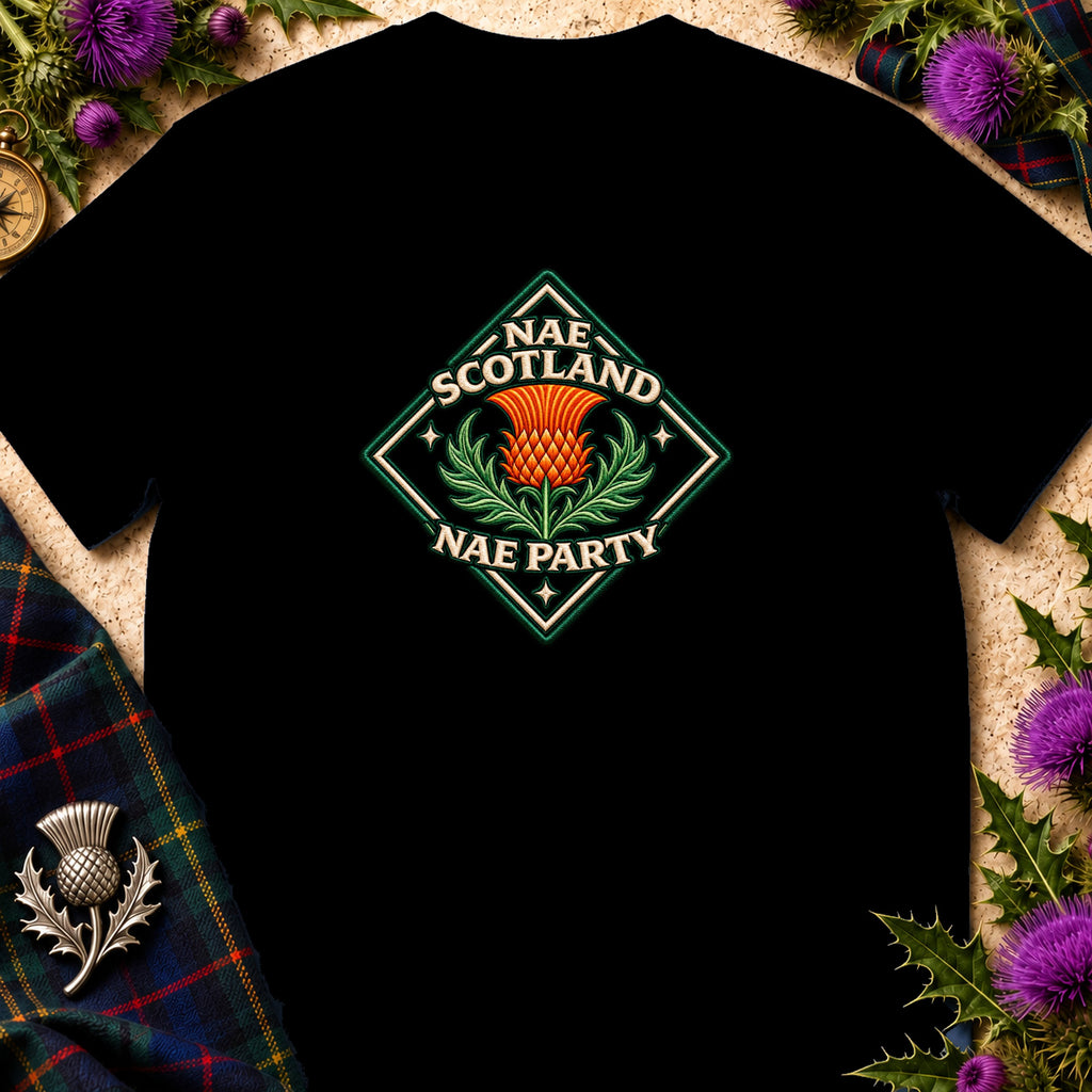 A black t-shirt featuring a diamond-shaped emblem with an orange thistle and the text Nae Scotland Nae Party.