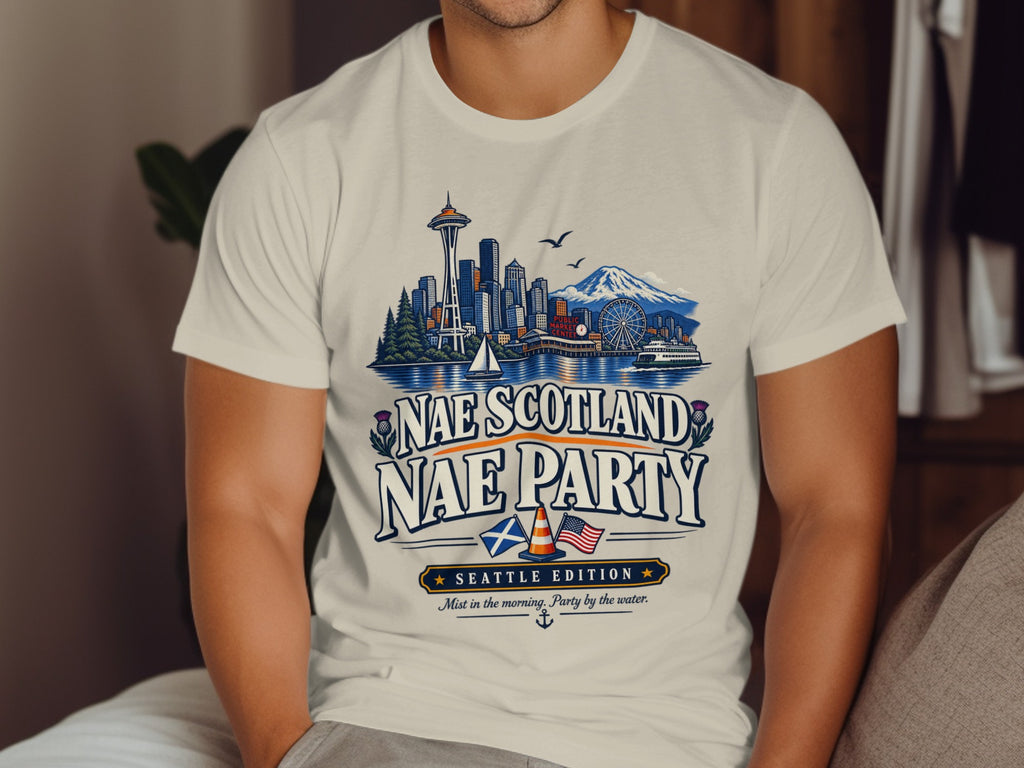 T-shirt with "Nae Scotland Nae Party Seattle Edition" text and Seattle skyline illustration.