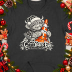 Highland cow in Santa hat holding traffic cone with lights, text reads "CooYears Eve Nae Scotland, Nae Party."