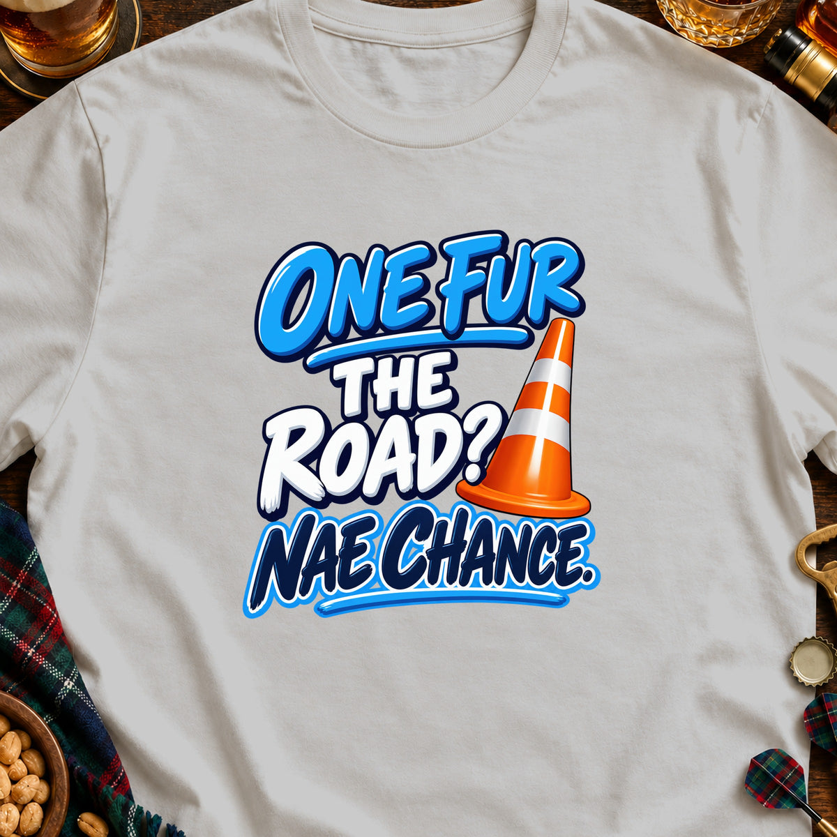 T-shirt with text "ONE FUR THE ROAD? NAE CHANCE" and traffic cone graphic.