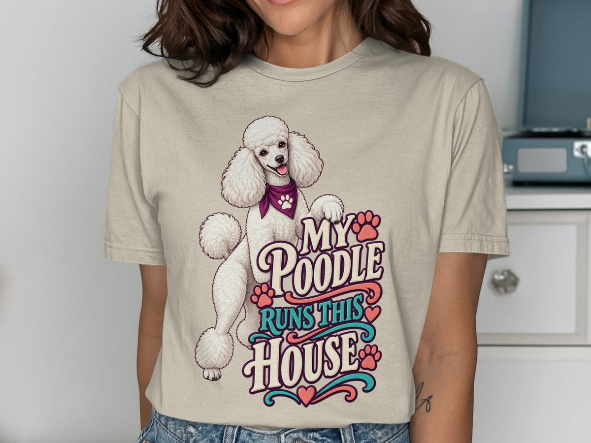 White poodle on t-shirt with text "My Poodle Runs This House".