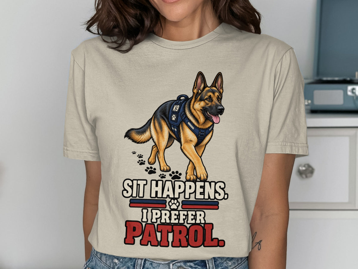 German Shepherd in K9 vest on shirt with text "Sit Happens. I Prefer Patrol."
