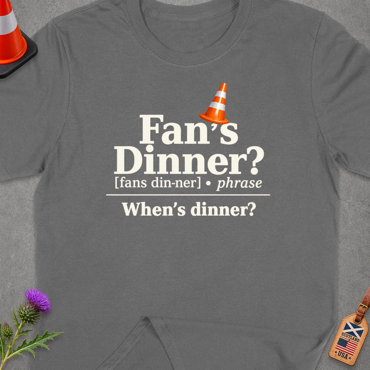 Grey t-shirt with "Fan's Dinner? When's dinner?" text and traffic cone graphic.