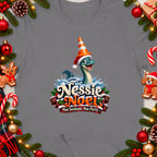 Nessie Noel with Loch Ness Monster, Santa hat, traffic cone, and text.