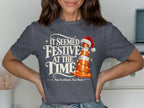 Dark grey t-shirt with "It Seemed Festive At The Time" and a traffic cone with Santa hat.