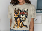 German Shepherd with "Trust Me, I'm the Security" text and paw print badge.