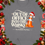 "Out of Office Into the Whisky" text with traffic cone, whiskey glass, and Christmas decor.
