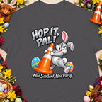 Cartoon bunny holding traffic cone with text "Hop It, Pal!" and "Nae Scotland, Nae Party."