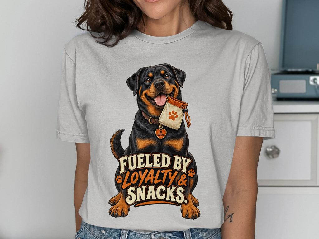 Rottweiler with snack bag and text "Fueled by Loyalty & Snacks".
