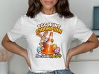 T-shirt graphic with a rabbit, traffic cone, Easter eggs, and text "Egg Hunt Champion".