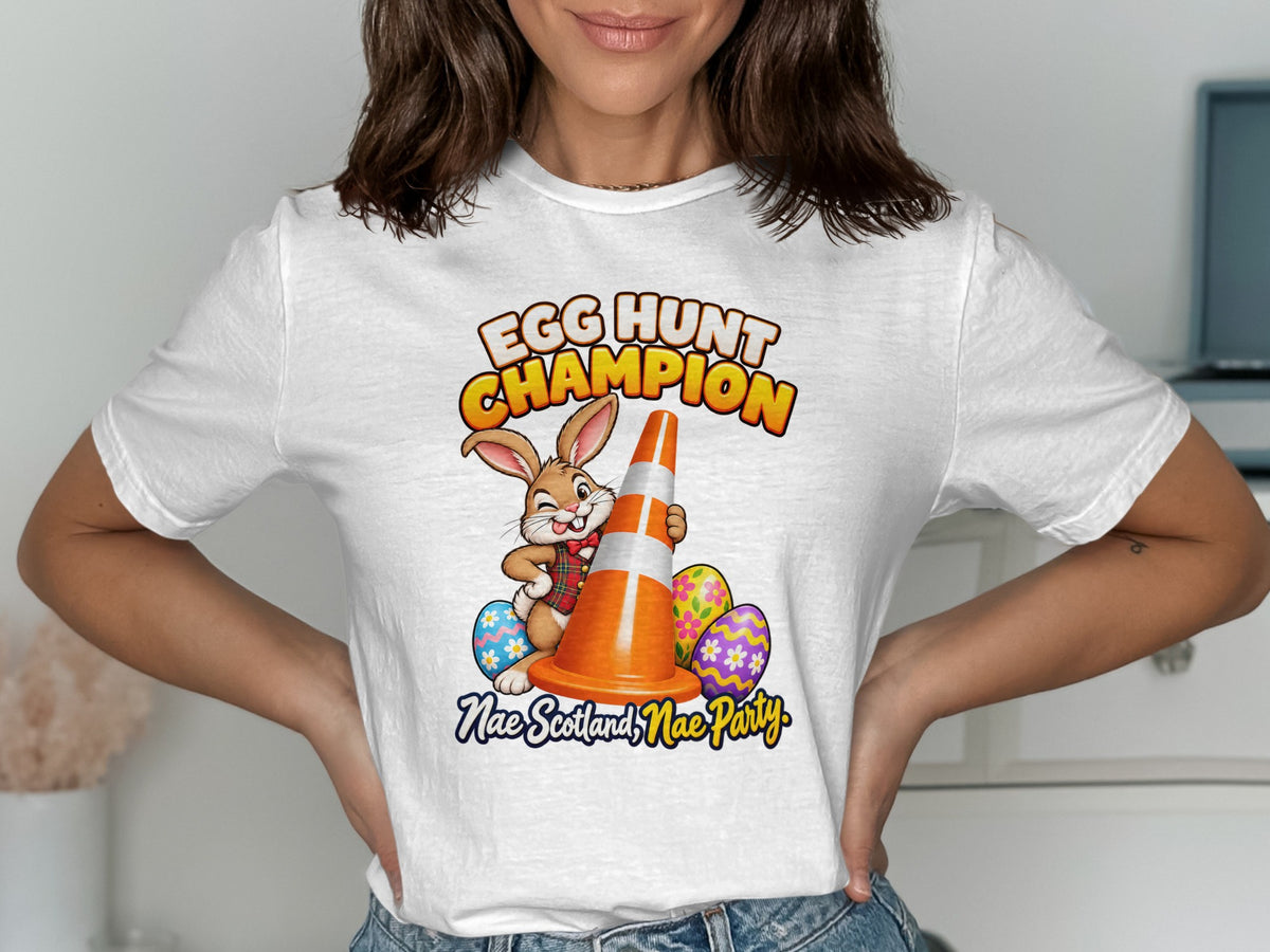 T-shirt graphic with a rabbit, traffic cone, Easter eggs, and text "Egg Hunt Champion".