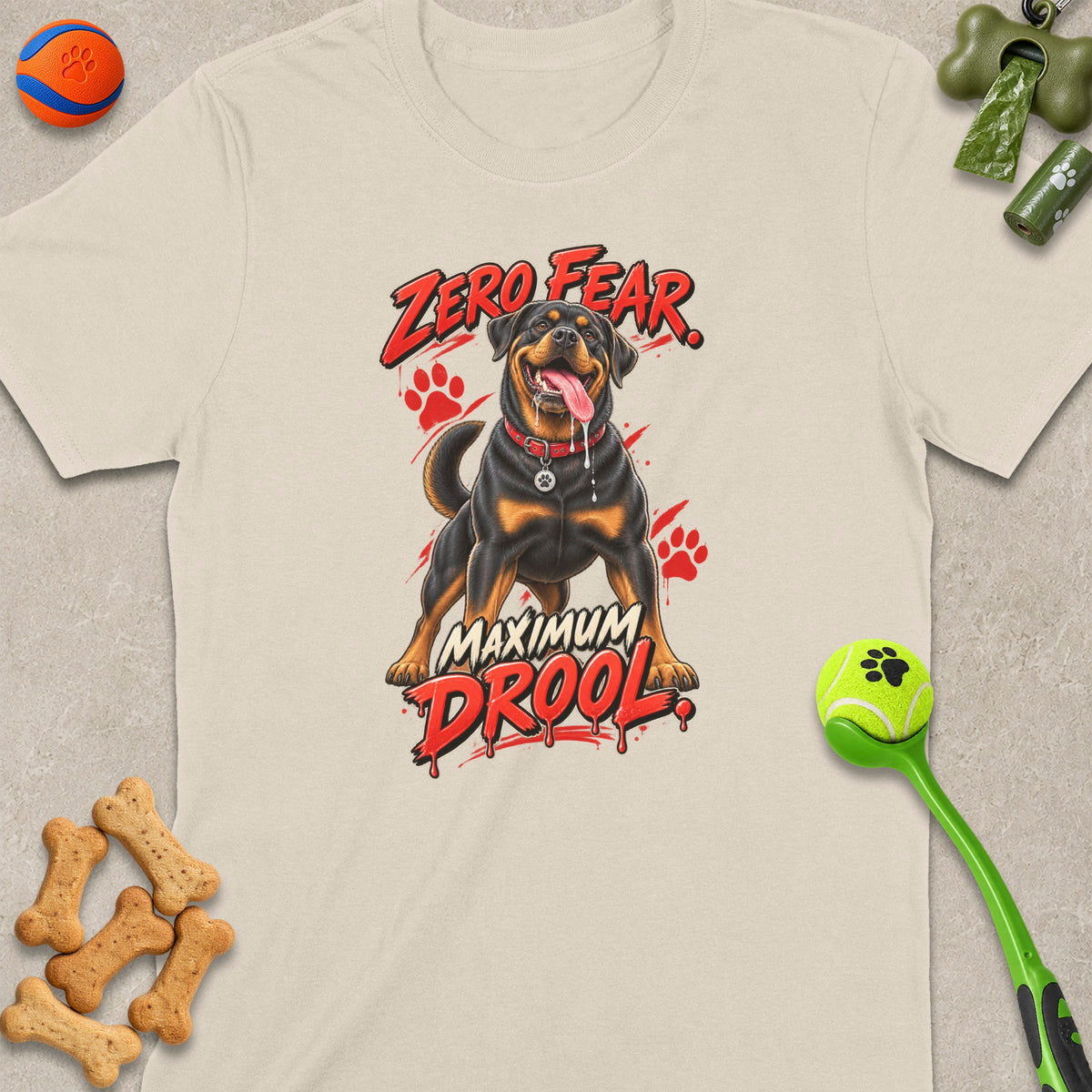 Rottweiler graphic with "ZERO FEAR MAXIMUM DROOL" text on a light t-shirt.