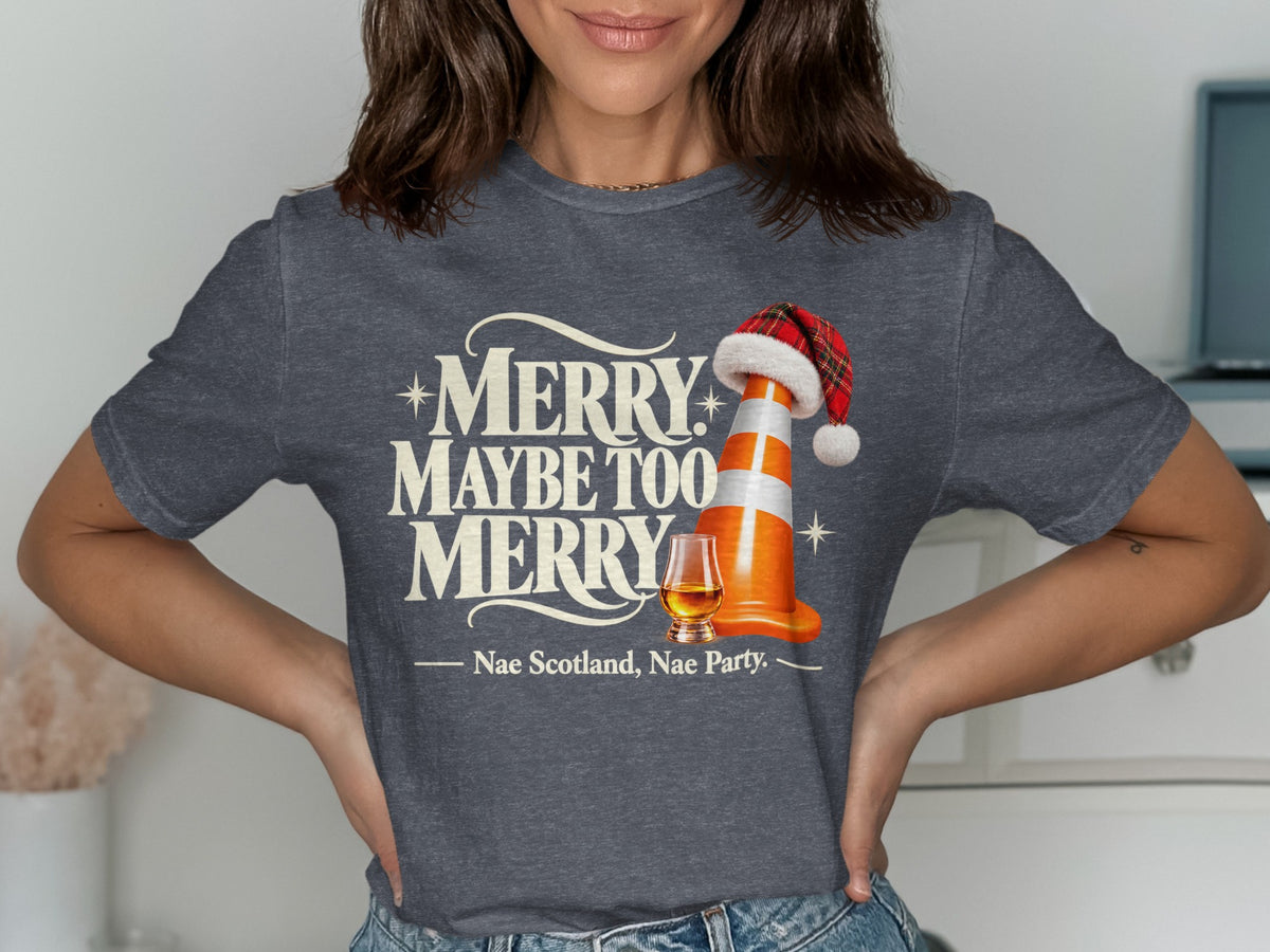 Dark grey t-shirt with "Merry Maybe Too Merry" text, traffic cone, and whisky.