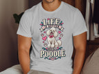 White t-shirt with a cartoon poodle and text that reads "Life is better with a poodle."