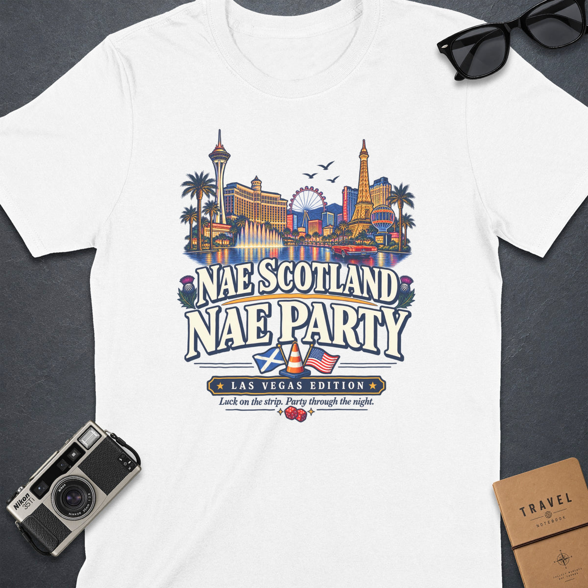 White t-shirt with Las Vegas skyline graphic and "Nae Scotland Nae Party" text.