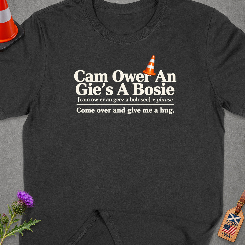 Dark t-shirt with text "Cam Ower An Gie's A Bosie" and a traffic cone graphic.