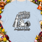 T-shirt with a cartoon bunny, traffic cone, basket, and text "Nae Eggs Left".