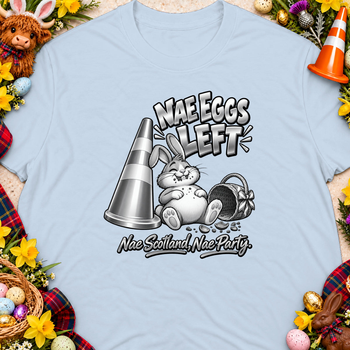 T-shirt with a cartoon bunny, traffic cone, basket, and text "Nae Eggs Left".