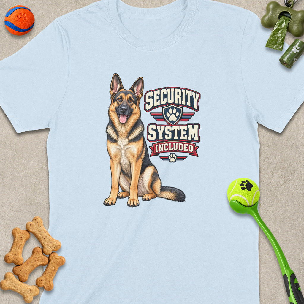 German Shepherd with "Security System Included" text on light blue t-shirt.