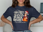 T-shirt with "Secret Santa, Public Regret. Nae Scotland, Nae Party." text and a traffic cone.