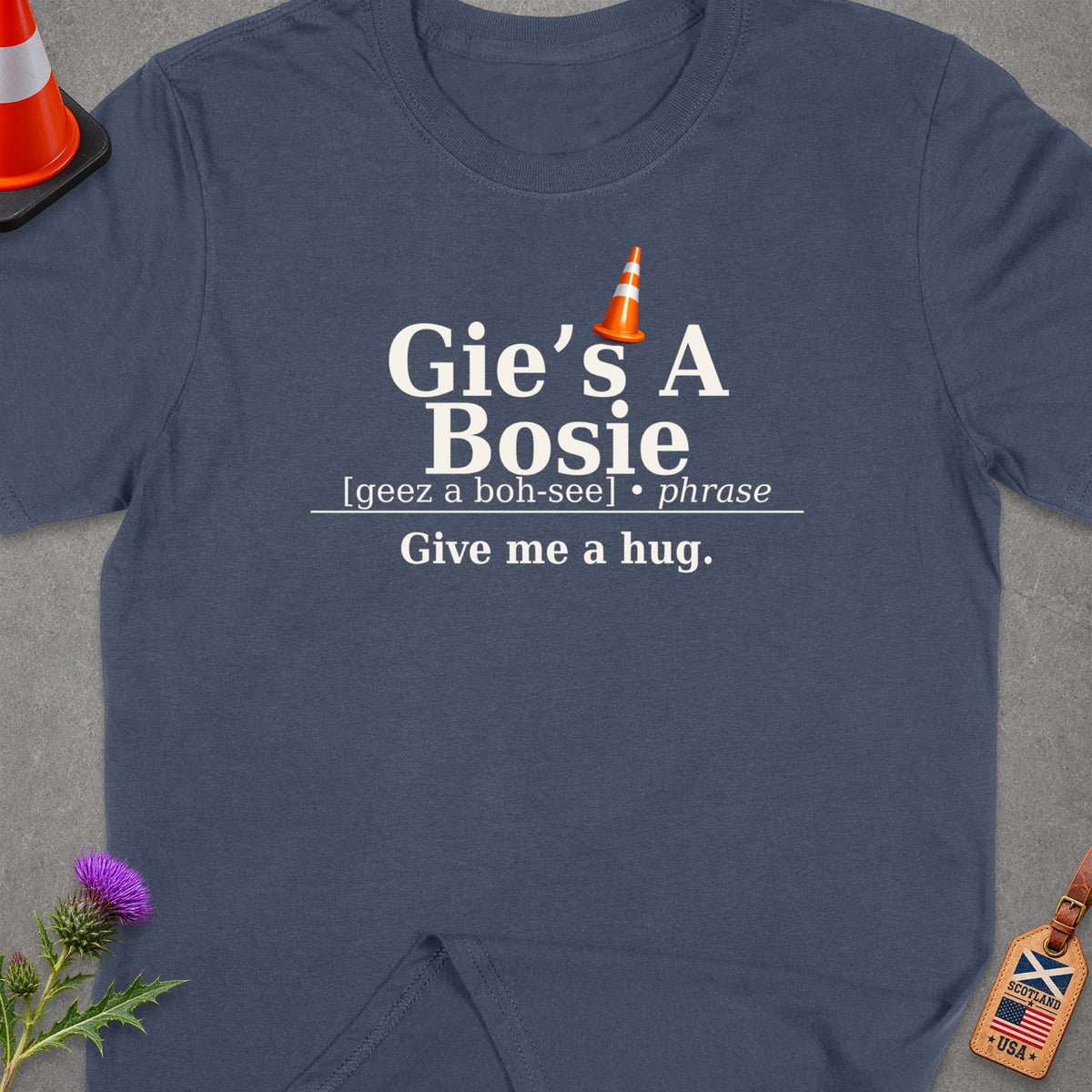Dark blue t-shirt with "Gie's A Bosie" and "Give me a hug." text.