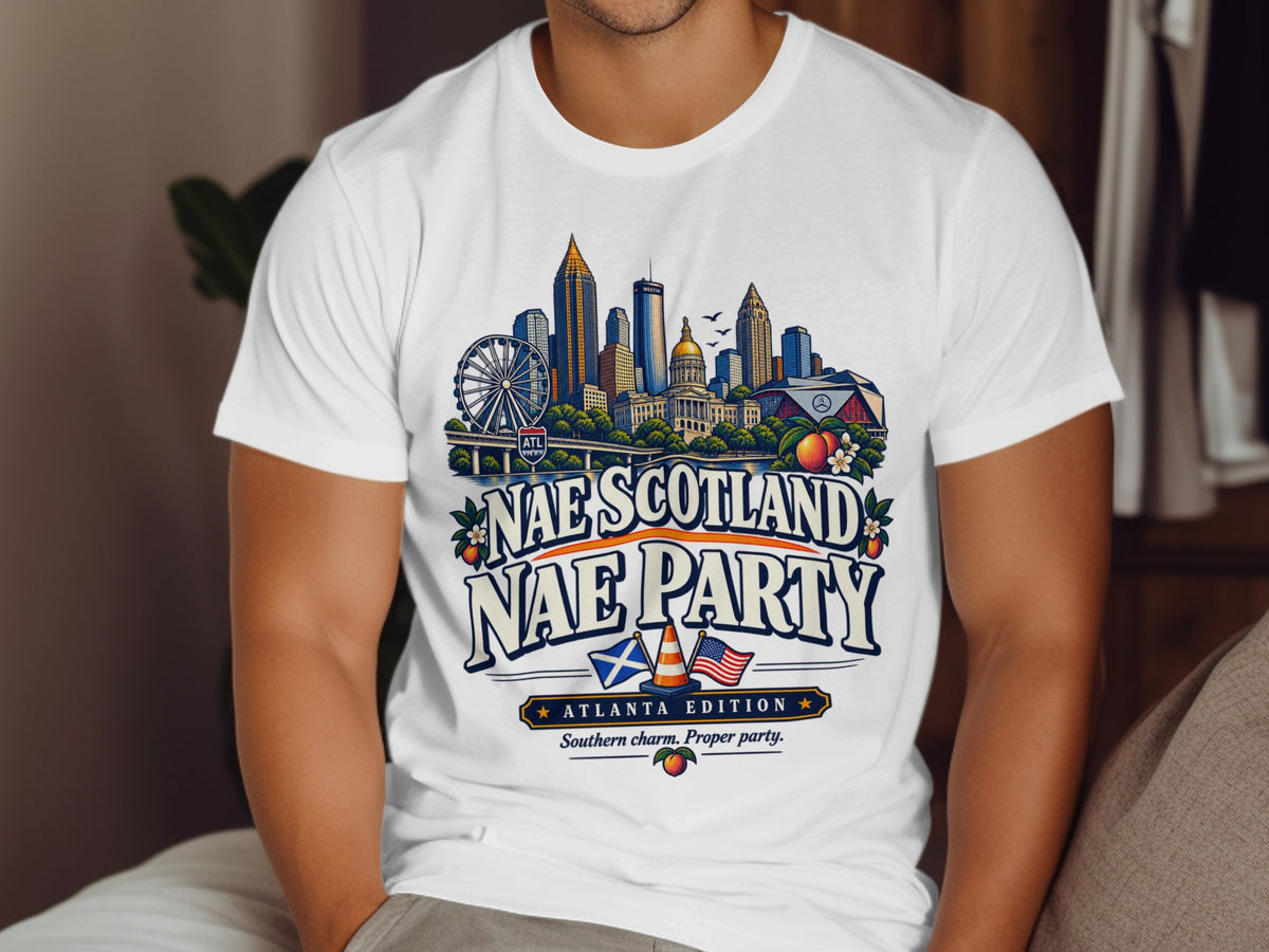 White t-shirt with Atlanta skyline, "Nae Scotland Nae Party Atlanta Edition" text, and peaches.