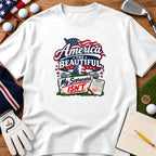 White t-shirt with patriotic golf graphic featuring an American flag, crossed golf clubs, and scorecard.