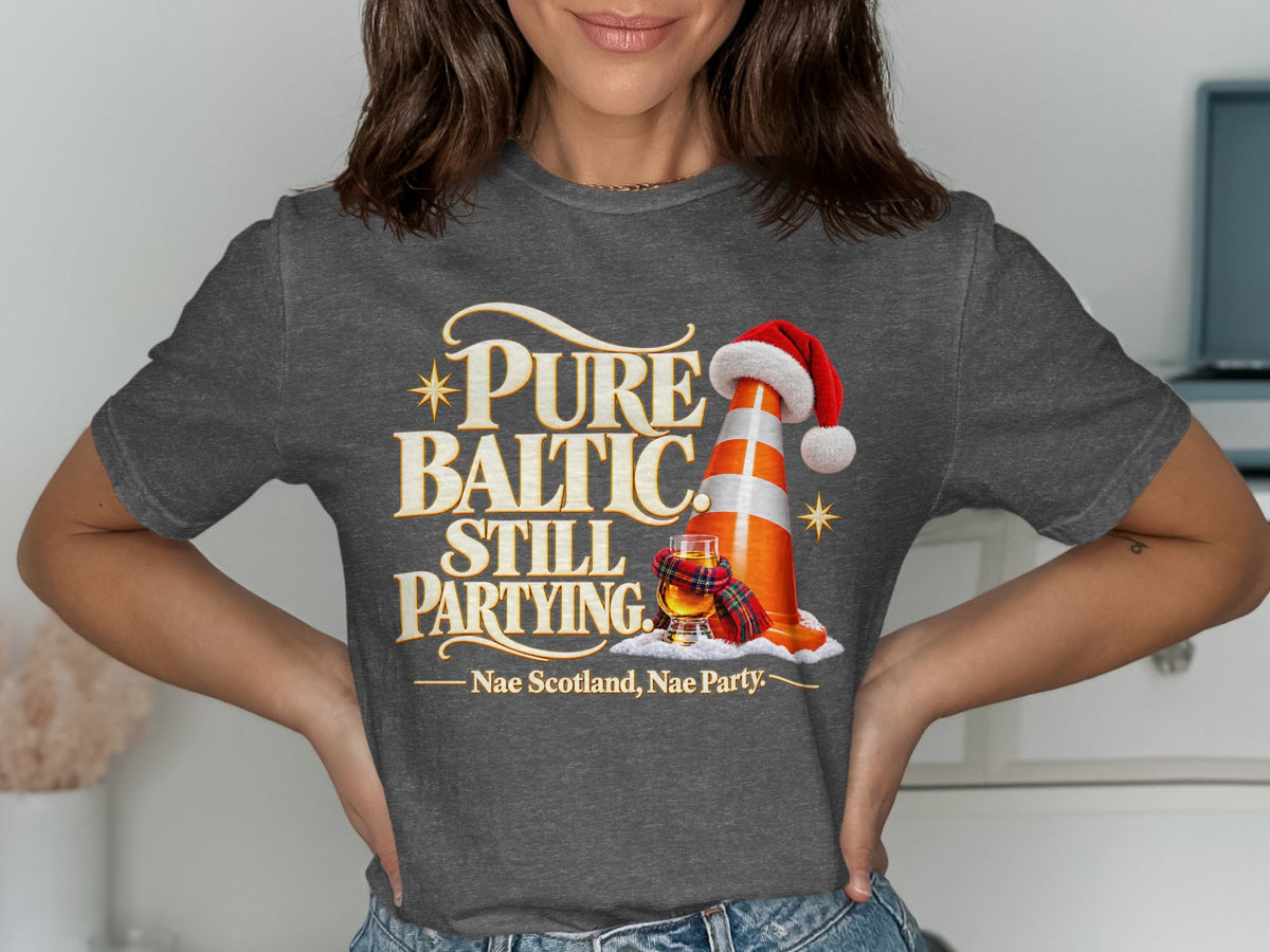 Dark grey t-shirt with "Pure Baltic. Still Partying." and a traffic cone in a Santa hat.