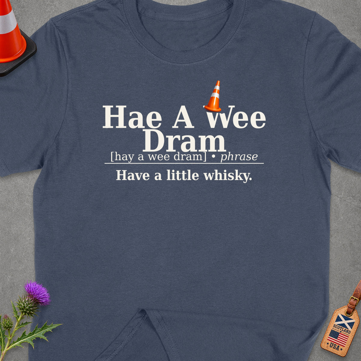 Dark blue t-shirt with "Hae A wee Dram" and definition.