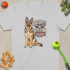 German Shepherd on grey t-shirt with "Security System Included" text graphic.