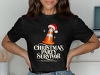 Black t-shirt with orange traffic cone wearing Santa hat and text "Christmas Party Survivor".