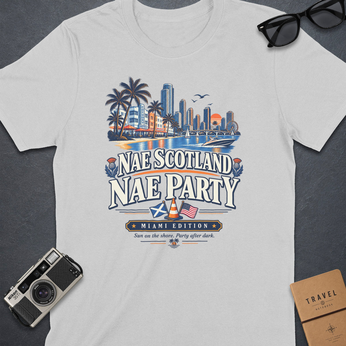 White t-shirt with "Nae Scotland Nae Party Miami Edition" graphic.