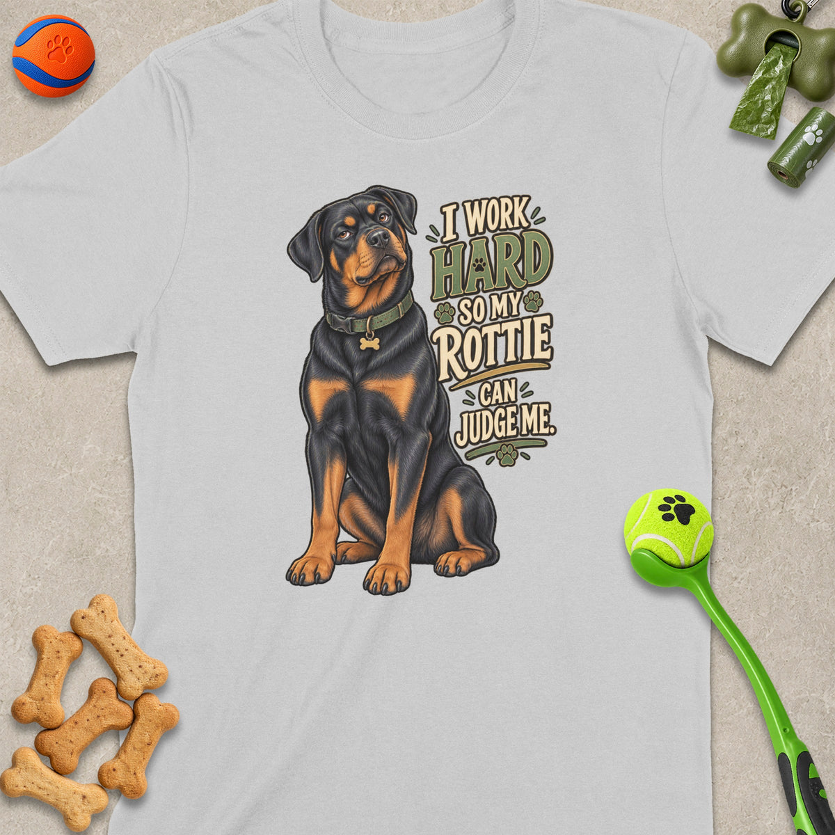 Rottweiler sitting with text "I WORK HARD SO MY ROTTIE CAN JUDGE ME."