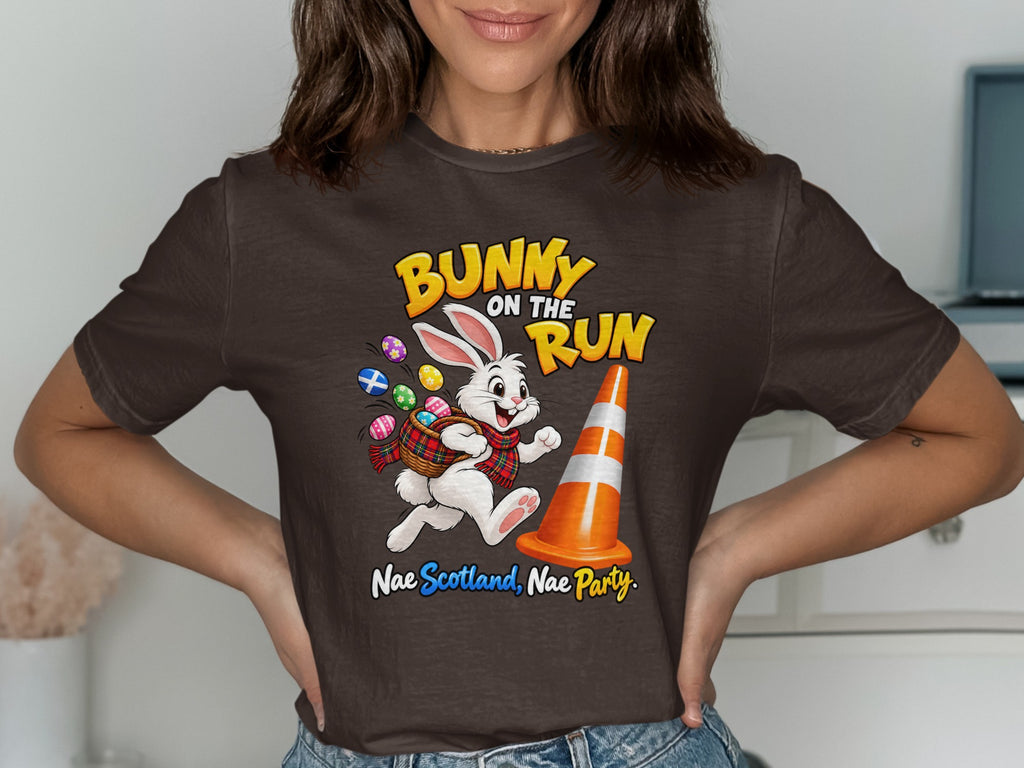 Bunny on the run graphic with Easter eggs, traffic cone, and Scottish text.