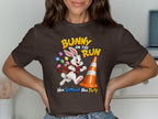 Bunny on the run graphic with Easter eggs, traffic cone, and Scottish text.