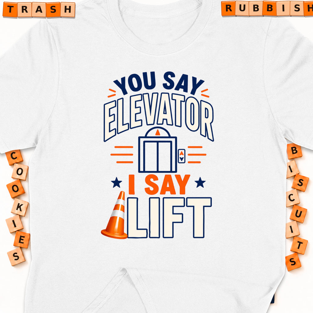 White t-shirt with "You say Elevator, I say Lift" graphic and orange traffic cone.