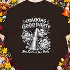 Three chicks celebrate around a traffic cone with text "Cracking Good Party Nae Scotland, Nae Party."