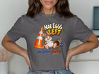 Gray t-shirt with cartoon bunny, traffic cone, and text "Nae Eggs Left."