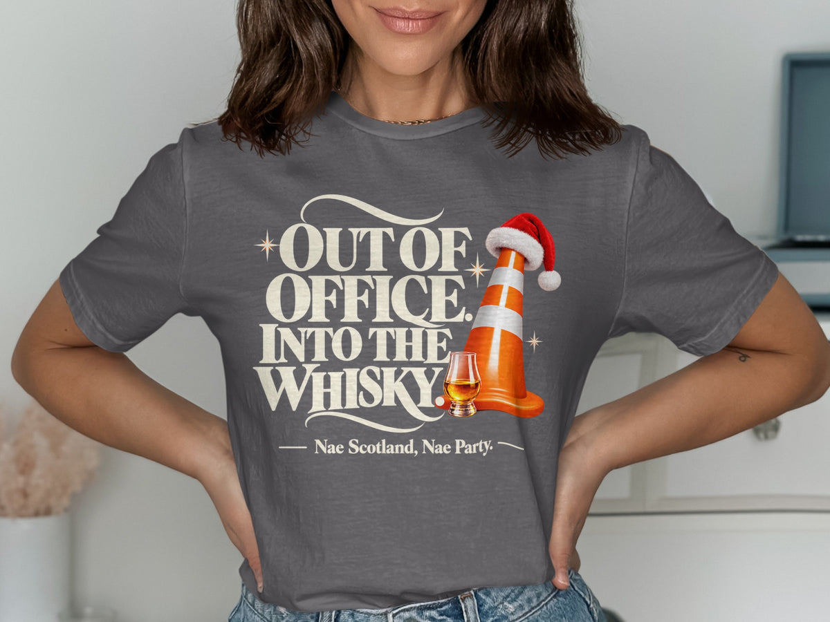 T-shirt graphic with "Out of Office. Into the Whisky." and a traffic cone with Santa hat.