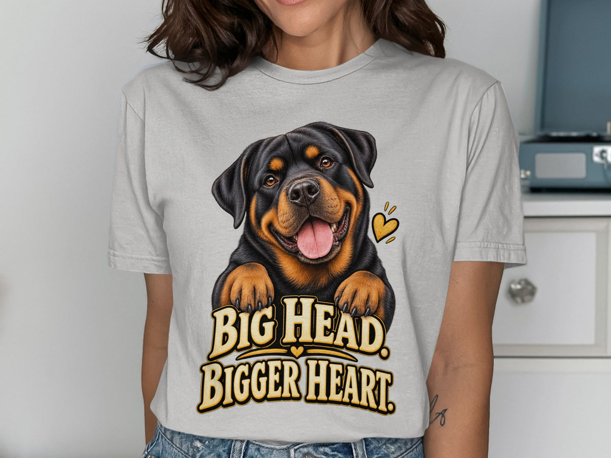 Rottweiler graphic on light grey t-shirt with text "BIG HEAD, BIGGER HEART".