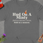 Dark grey t-shirt with text "Hud On A Minty" and a traffic cone.