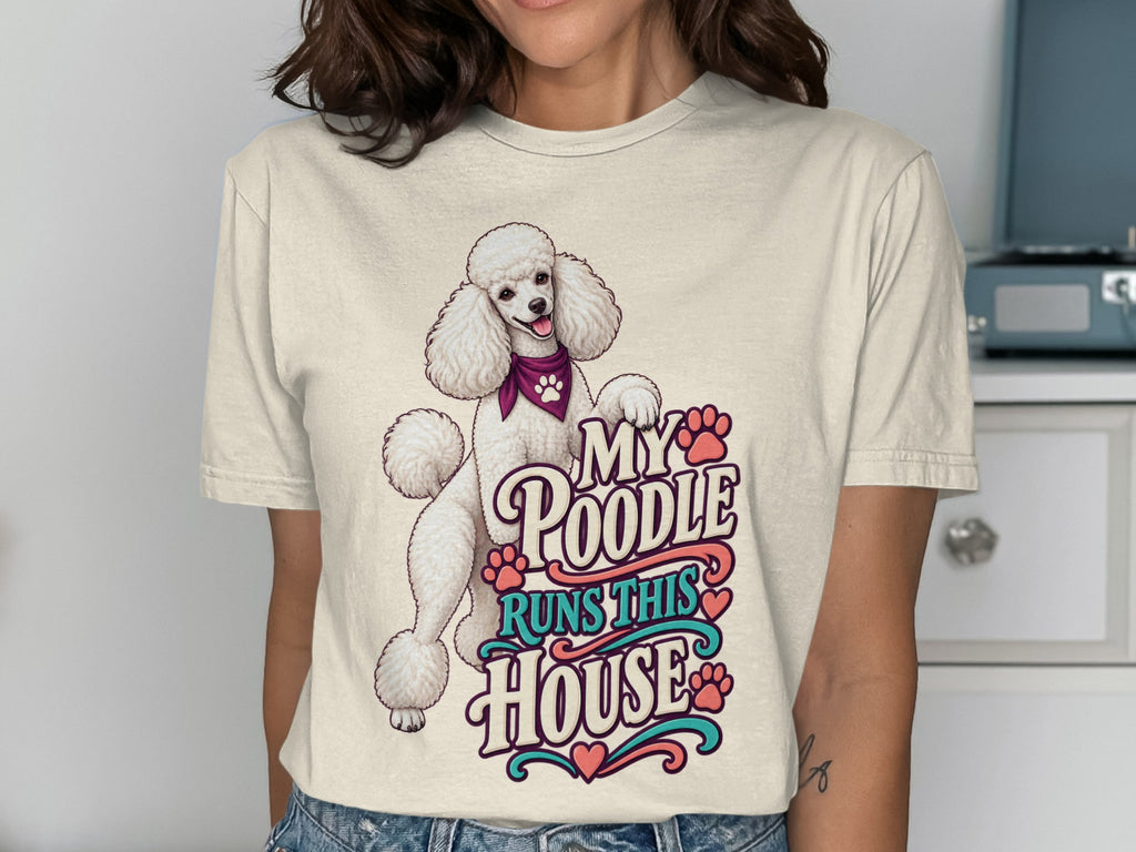 Cream t-shirt with a white poodle graphic and text "My Poodle Runs This House".