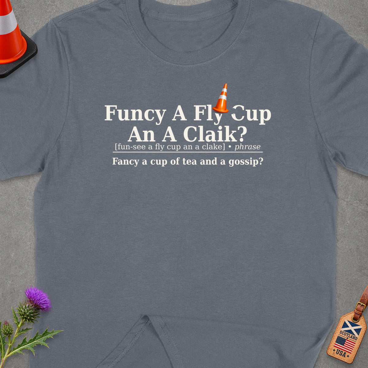 Gray t-shirt with Scottish phrase "Funcy A Fly Cup An A Claik?" and its definition.