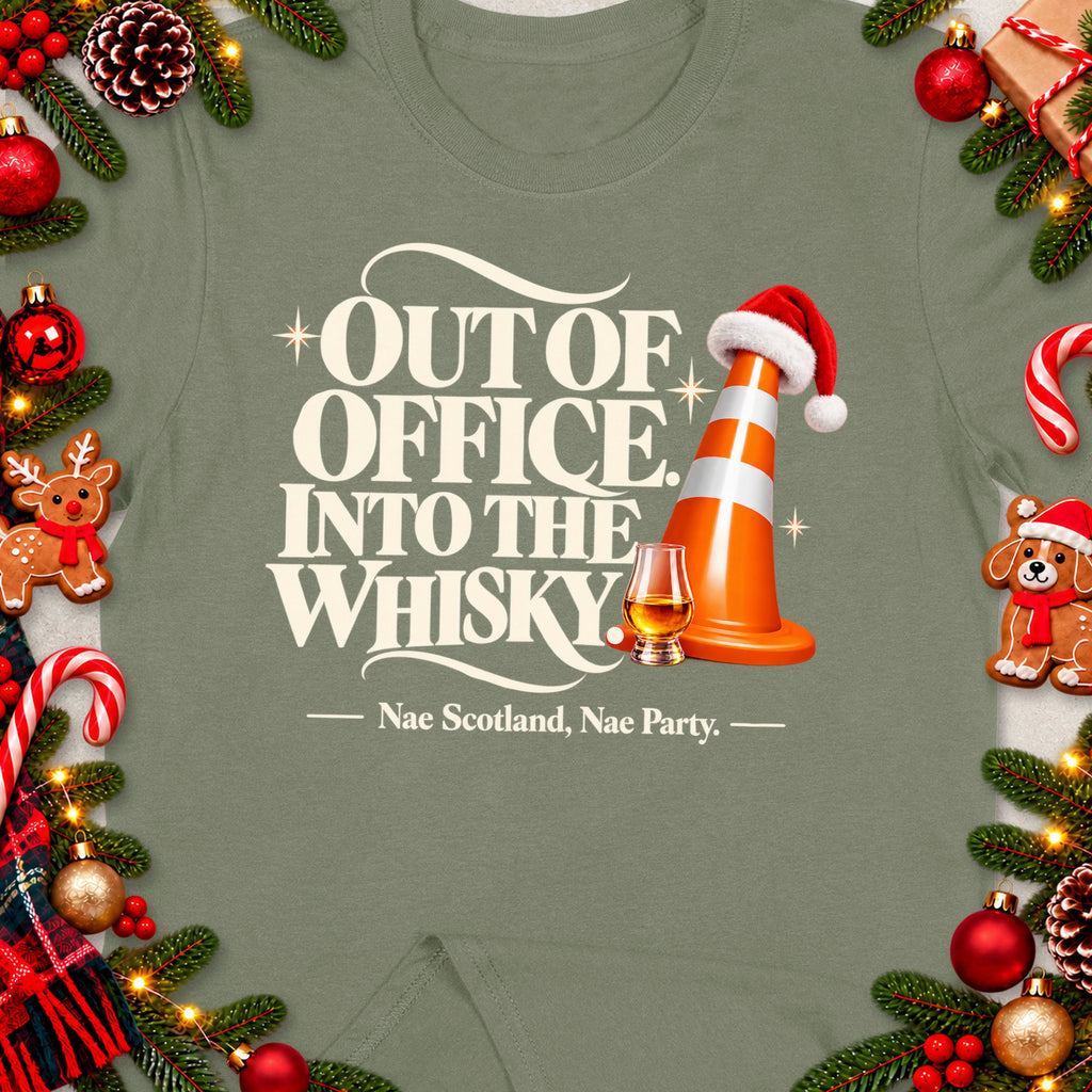 Green t-shirt with "Out of Office. Into the Whisky." text and festive decorations.