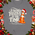 Grey t-shirt with "It Seemed Festive At The Time Nae Scotland, Nae Party." text and a traffic cone.