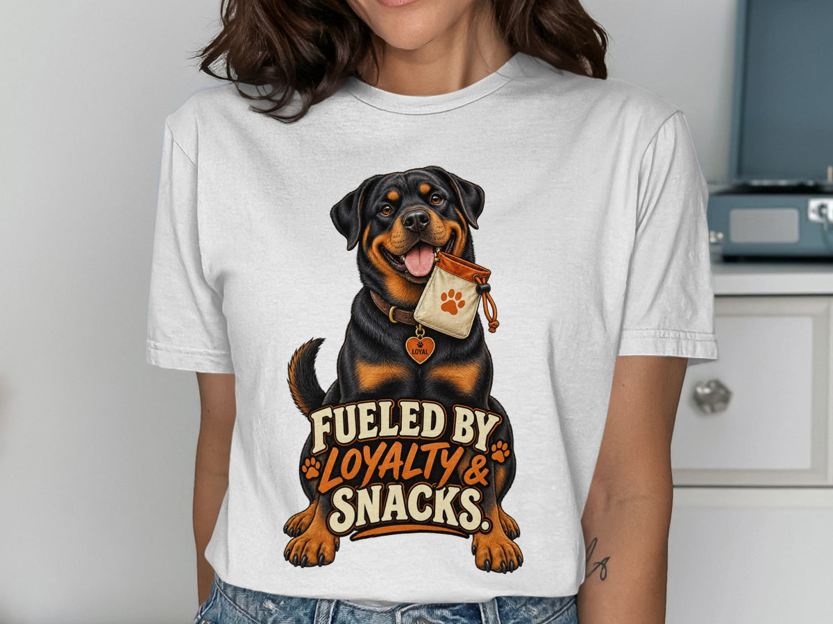 Rottweiler with a treat bag and text "Fueled by Loyalty & Snacks."
