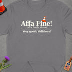 Grey t-shirt with "Affa Fine! Very good / delicious!" and Scottish/USA flag tag.